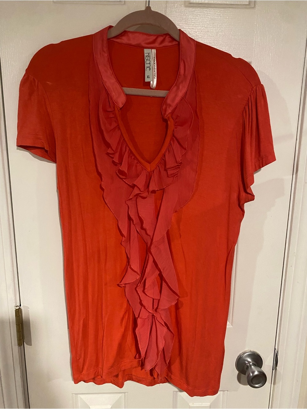 Kische Coral Ruffled V-Neck Short Sleeve Blouse